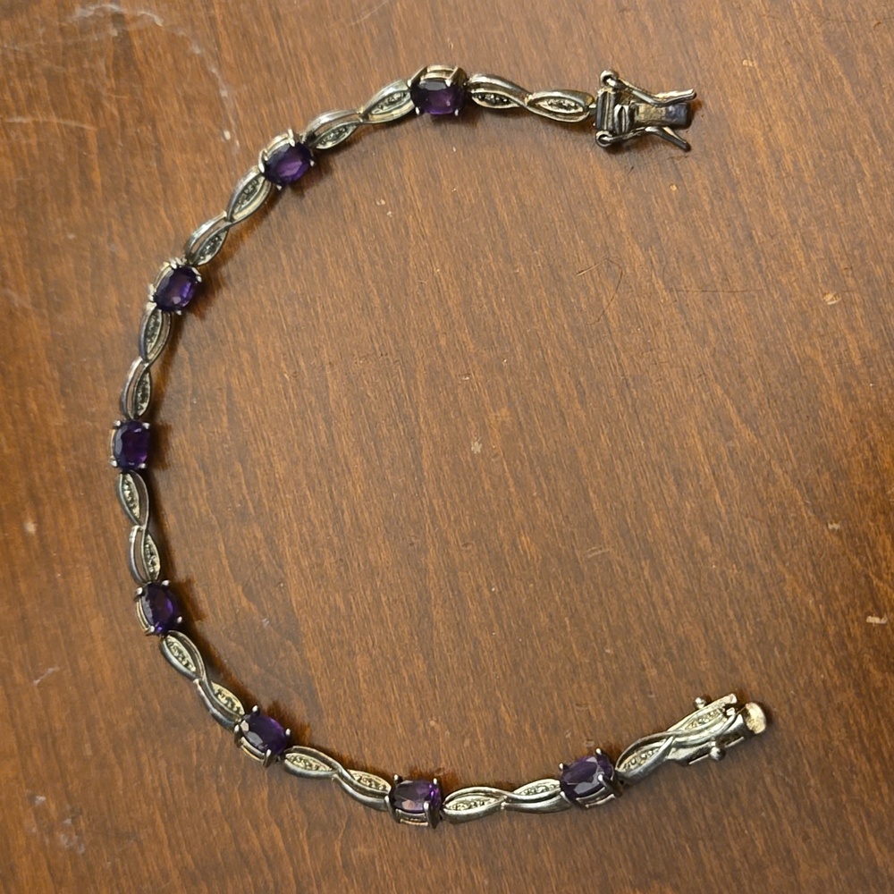 Sterling silver bracelet with purple stones